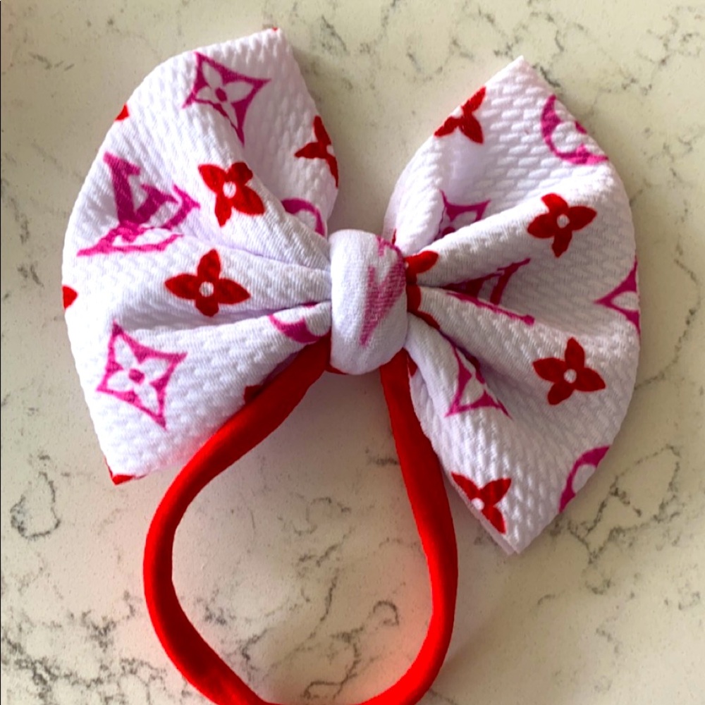 Louis Vuitton Valentine Bow! Can convert to a clip